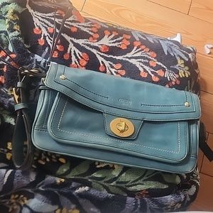 Coach large wristlet, a beautiful pale blue, some minor scratches on the outside